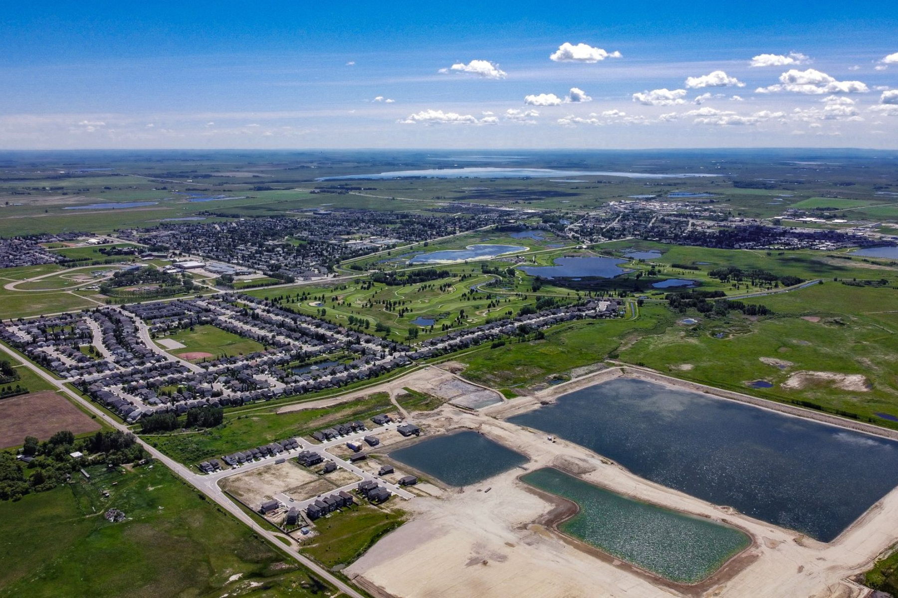 Aerial view of Lakewood and newer development in Strathmore Alberta